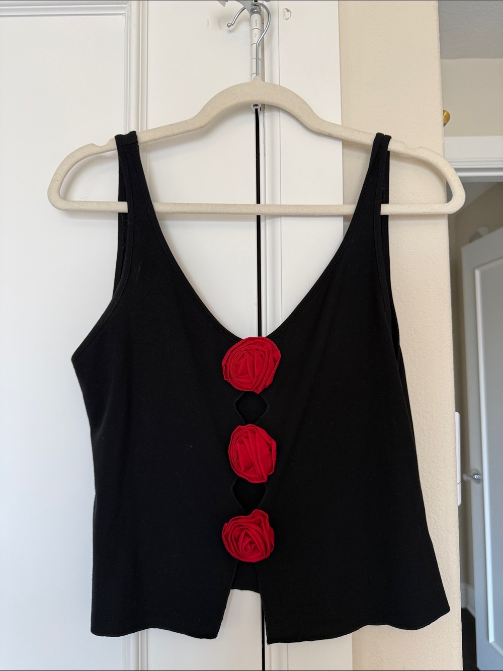 Reformation Black Tank Top with Red Rosette Accents